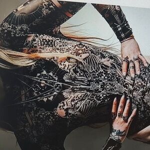 NWT SHEER SKULL BODYSUIT